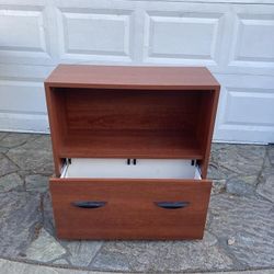 
Bookcase with storage drawer