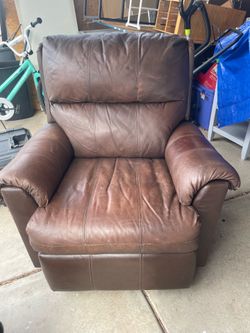 Brown. Rocker recliner