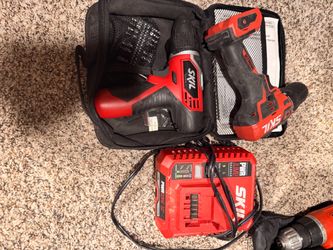 Skil power drills and charger