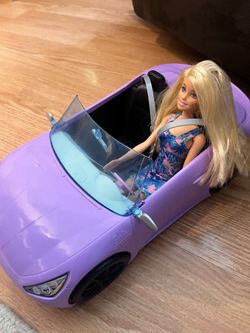 Barbie doll and convertible car