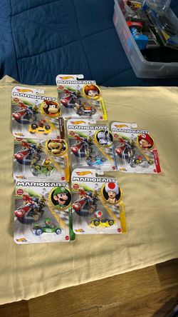 A lot of 7 hot wheels Mario cart