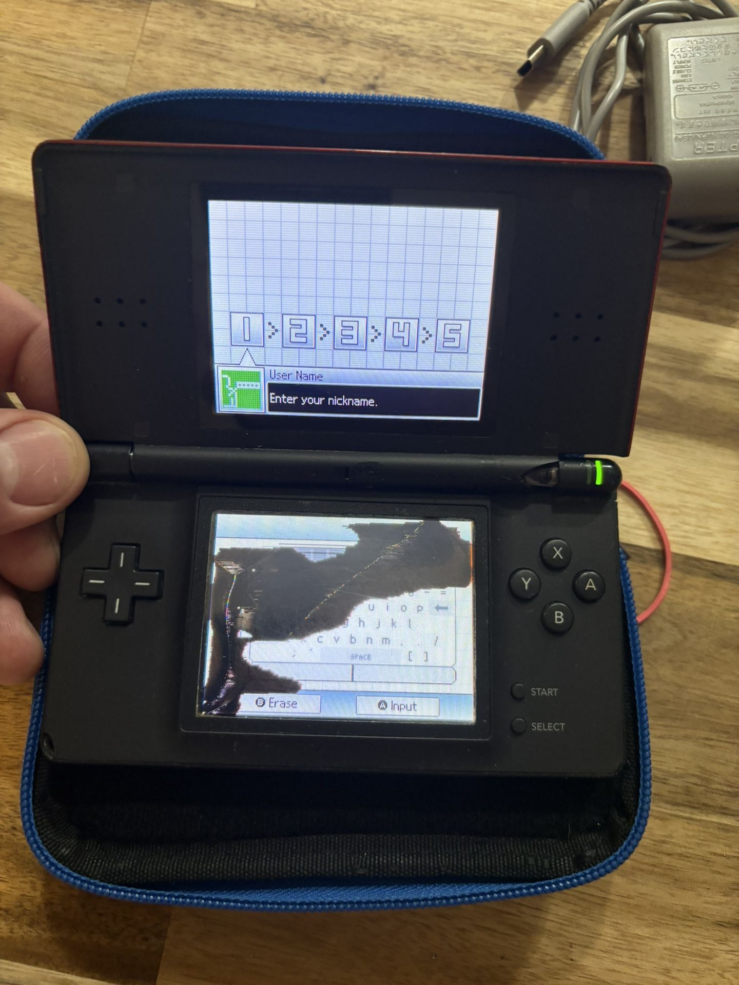 Nintendo DS cracked screen an hinge is cracked see pictures.
