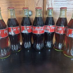 7 Collectable NASCAR Cokes