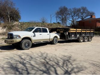 Dump trailer , skid steer . Brush cuter . Wash rock .