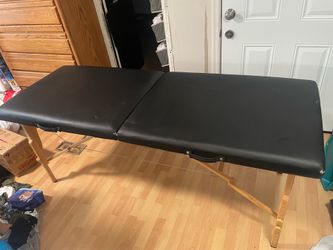 Massage table