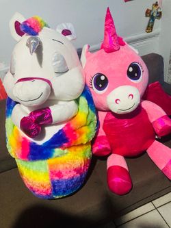 Giant unicorn plushies