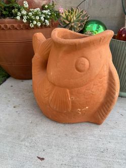 Bubbling fish terracotta planter