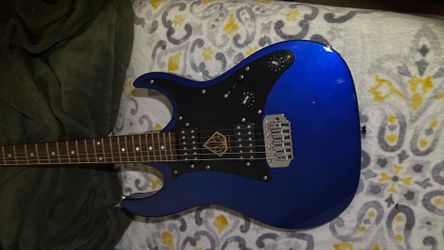 Electric guitar and amplifier