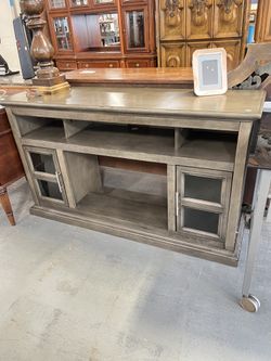 Grey tv stand (in store)
