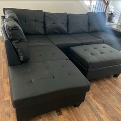 Black Leather Sectional with Storage Ottoman 