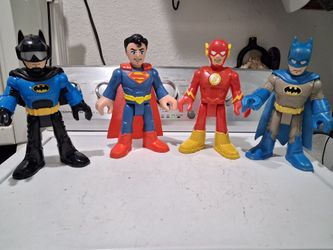 The Fisher Price imaginext DC Super Friends SUPERMAN, BATMAN,  FLASH, and BATMAN...XL action figures.  Good condition.