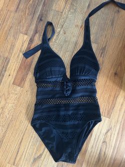 Size 4 Black one piece swimsuit with textured mesh detailing