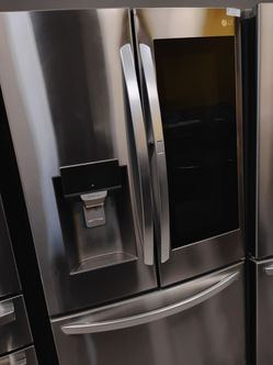 Refrigerador LG gris de 3 puertas