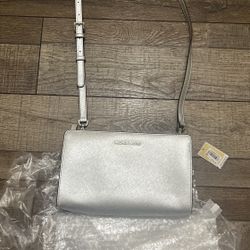 AUTHENTIC MK CLUTCH (silver) NEW!!