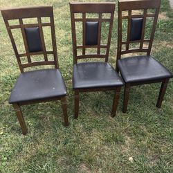 The brown wooden Kitchen chairs