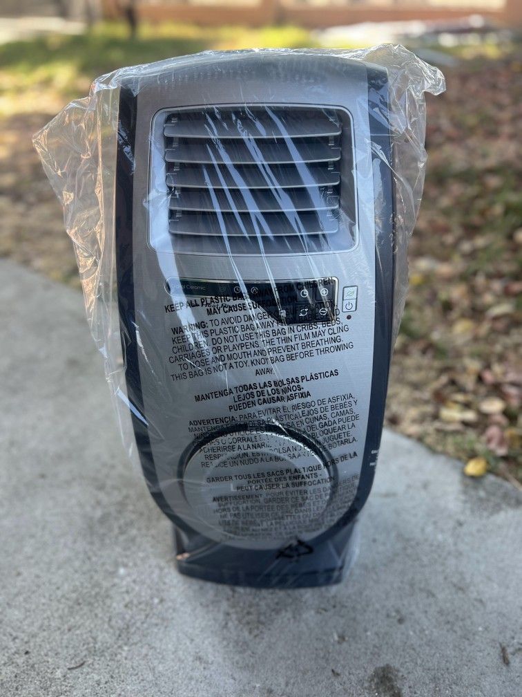 Lasko Motion Heat 1500w Electric Ceramic Heater w/Remote Control & SaveSmart Technology (No Box, No Caja)
