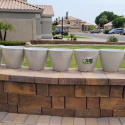 Vigoro 13 in. Kingfield Medium Beige Woven Texture Resin Planter (13 in. D x 10.8 in. H) with drainage hole