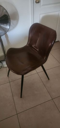 2 of these fake leather chairs