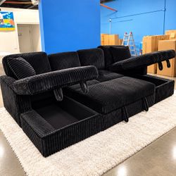 Black corduroy sectional sleeper sofa with pull out bed