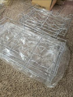 Different kind racks organizer, wine racks and more all new never used, make me a offer everything all together