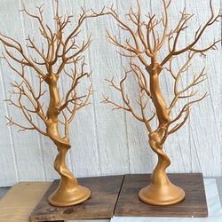 Esto es un centro de mesa de árbol de manzanita metálico dorado. Explorar en detalle el Modo IA Las respuestas de la IA pueden incluir errores.