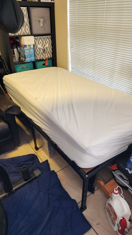 Barly Used Twin Bed.