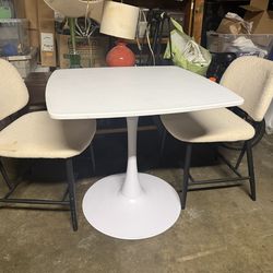 Table and two chairs