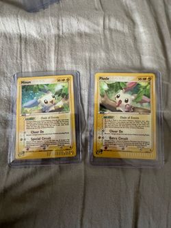 Pokemon: plusle 8/97 Holo and minun 7/97 Holo