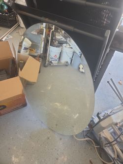 2 Large oval mirrors