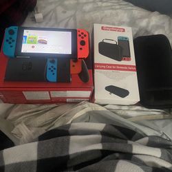 Brand New Nintendo Switch With The Carrying Case 