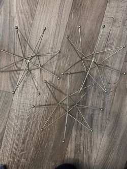 3 gold metal wall decorations