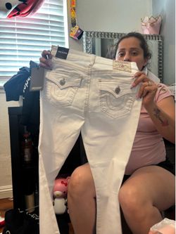size 26 true religion pants and size 0 ed hardy pants