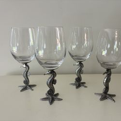 4 Large Pewter Seahorse Stem Wine Glasses with Star Fish Base, (3) 8 3/4" Tall, (1) 7 3/4” Tall, $60. Used once. 