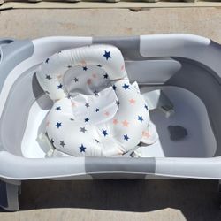 Bañera $20 y cangurera $15