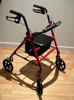 Rollator walker with seat
