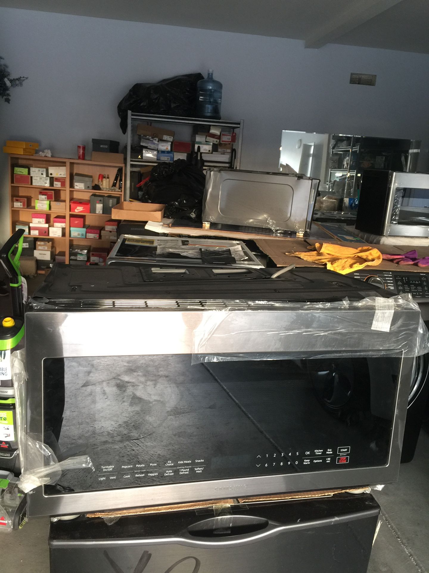 Brand new Samsung mircrowave with vent hood