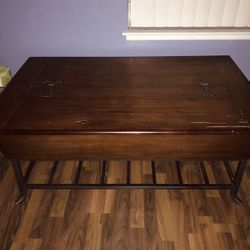 Ashley Large Coffee Table,  Opens On Top For Storage See All Pictures.  Has some Chips On Top Minor Repair, Best Offer 