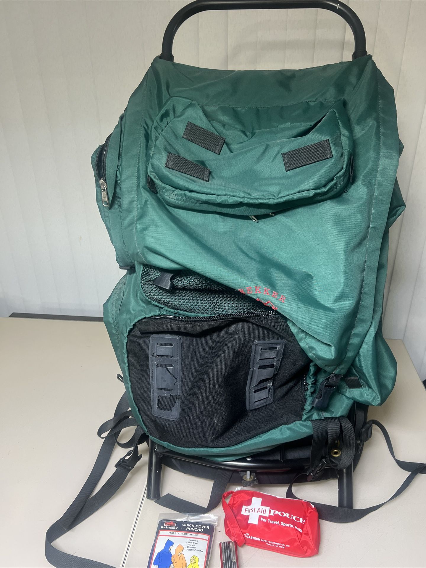 REI Trekker Wonderland External Aluminum Frame Light weight Backpack M/L READ. Used in good condition with a couple of blemishes. One, the front rubbe