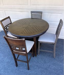 5-PC HIGH TOP BROWN FINISHED DINING SET (ROUND TABLE AND 4 PADDED CHAIRS)