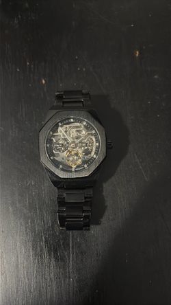 Black skeleton watch