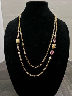 Park Lane gold-tone chain necklace features pink crystal stations and faux pearl accents.