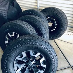 Like New Tacoma TRD 265 75 R 16” Goodyear  Wrangler A/T Territory. Excellent Condition. 100% Complete W/sensors Caps And Lug Nuts. & New Spare 