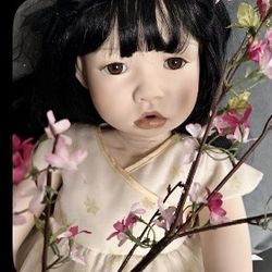 Porcelain Doll By Christine Orange