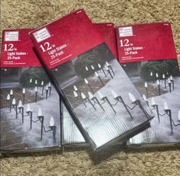 Holiday light stakes 4 brand new boxes