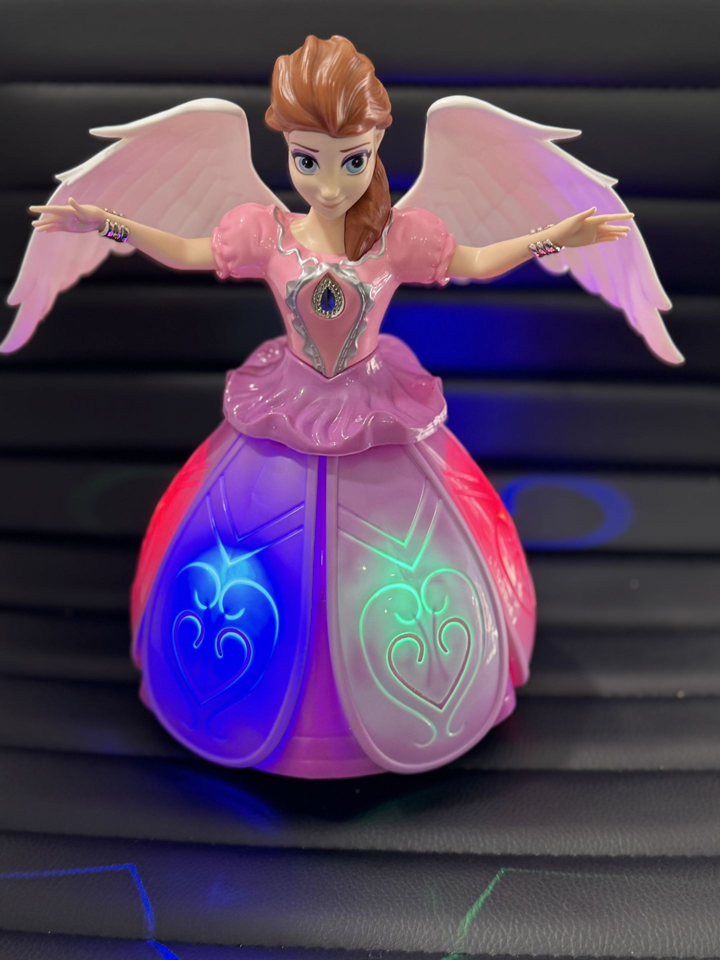 Angel Girl Dancing Doll and Omni-Directional Make Auto Turns Light Projection.