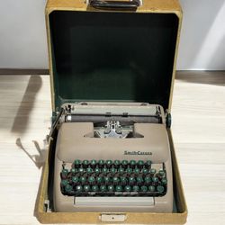 Vintage Smith Corona Sterling portable typewriter in case