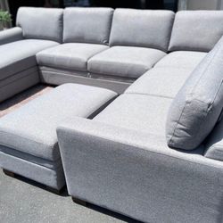 Gray Sectional Couch With Storage Ottoman  