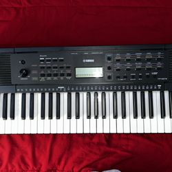 Black Yamaha Piano , Model PSR-E273