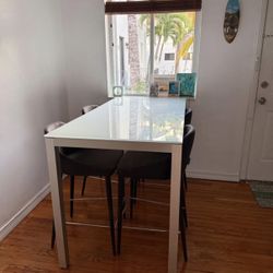 Glass table and chairs