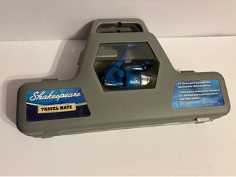 Shakespeare Travel Mate fishing rod and reel combo in a grey carrying case.